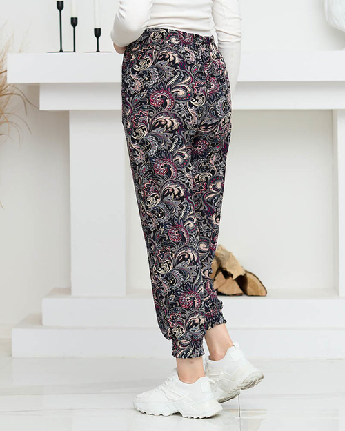 Чорні жіночі штани PLUS SIZE з малюнком - Одяг