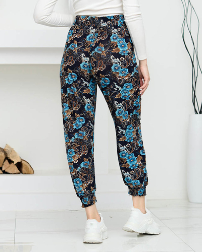 Marineblaue und türkise Damenhose mit Blumen PLUS SIZE - Kleidung