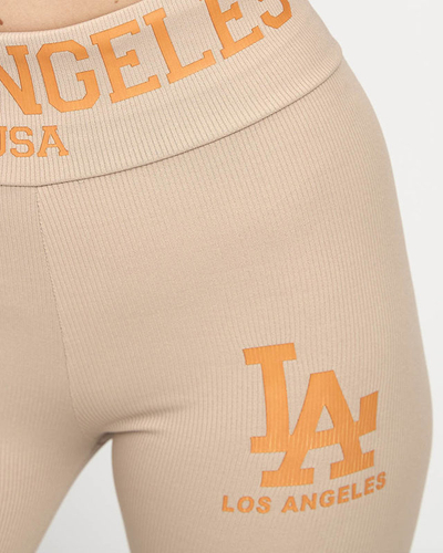 Hellbraune gestreifte Damenleggings mit orangefarbenen Aufschriften - Kleidung
