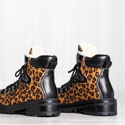 Stiefel mit Leopardenmuster, isoliert mit Dori-Schaffellmantel - Schuhe