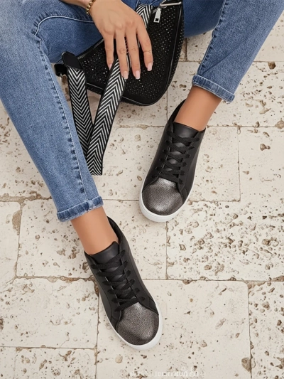 Damen-Sneakers Calista Nero – schwarze flache Lederschuhe für den Frühling