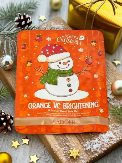 Weihnachts-Tuchmaske für das Gesicht mit Vitamin C - Aufhellend