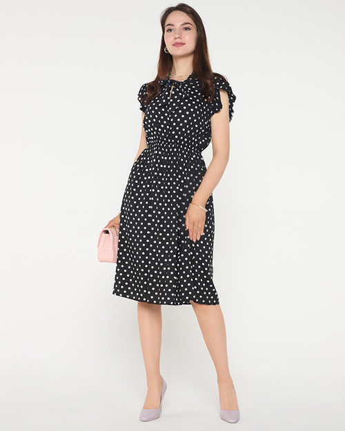 Чорна жіноча сукня в горошок