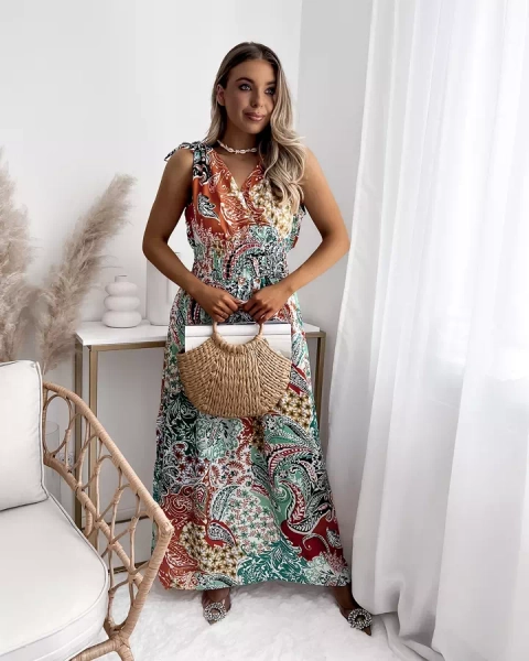 Візерунчаста жіноча сукня міді зеленого та оранжевого кольору Одяг