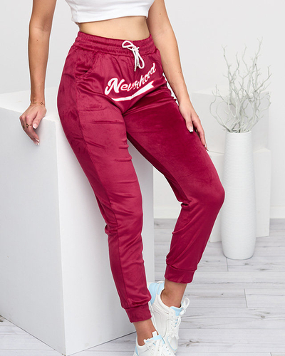 Damen-Jogginghose aus kastanienbraunem Velours mit der Aufschrift - Kleidung