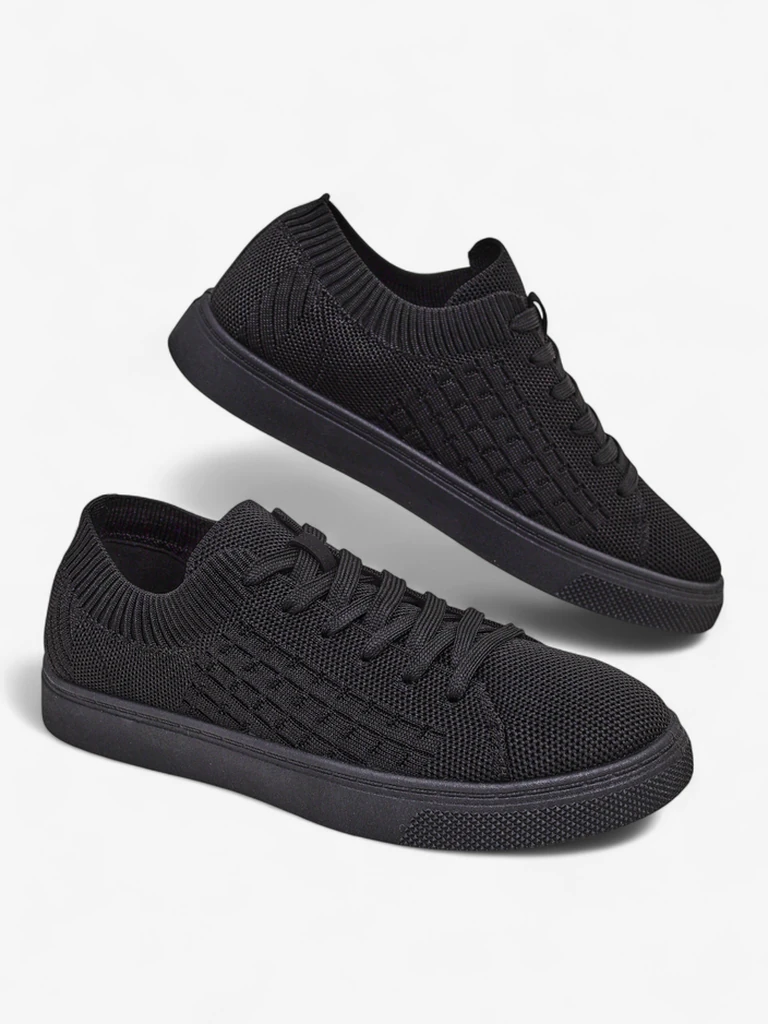 Royalfashion Demetra – schwarze Damen-Sneakers aus Stoff mit flacher Sohle