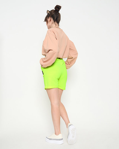 Neongelbe Damen-Shorts oberhalb des Knies - Kleidung