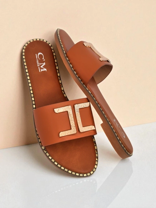 Royalfashion Жіночі шльопанці зі штучної шкіри з декором Gildra