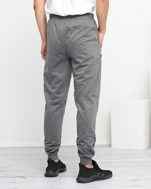 Чоловічі сірі спортивні штани з кишенями - Одяг