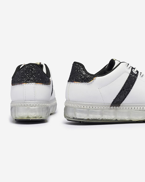 Жіночі спортивні кросівки білого кольору з чорними вставками Asxa- Footwear