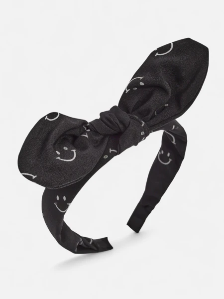 Royalfashion Kinderhaarband mit Schleife und Print aus lächelnden Gesichtern