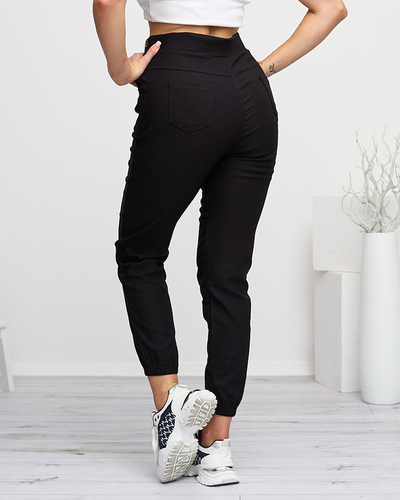 Чорні жіночі спортивні штани з золотими написами