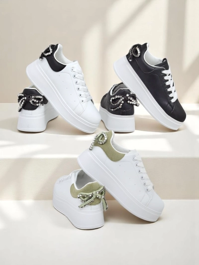Royalfashion Жіночі спортивні кросівки на платформі з бантом Рібон