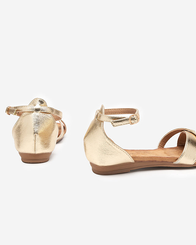 OUTLET Золоті жіночі сандалі на плоскій підошві Ruddy - Взуття