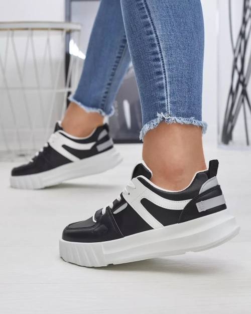Жіночі повсякденні спортивні туфлі з екошкіри чорного кольору з білими вставками Netiris - Взуття