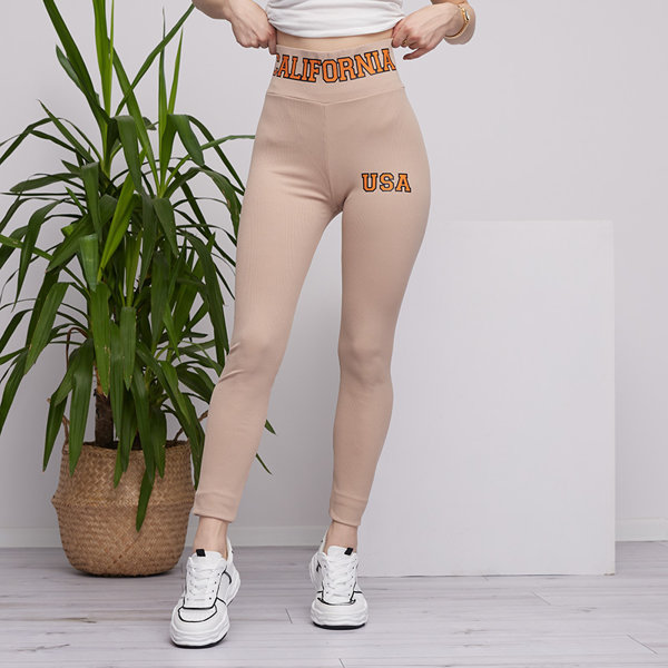 Beige gestreifte Damen-Leggings mit orangefarbenen Aufschriften - Kleidung