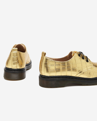 Goldener Damenschuh mit Seniri-Prägung - Schuhe