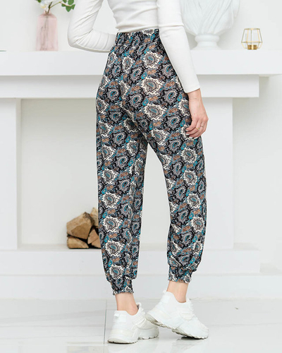 Чорні жіночі штани з малюнком PLUS SIZE - Одяг