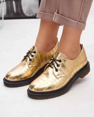 Goldener Damenschuh mit Seniri-Prägung - Schuhe