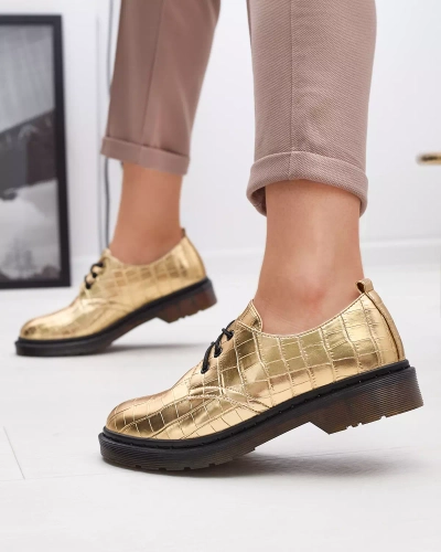 Goldener Damenschuh mit Seniri-Prägung - Schuhe