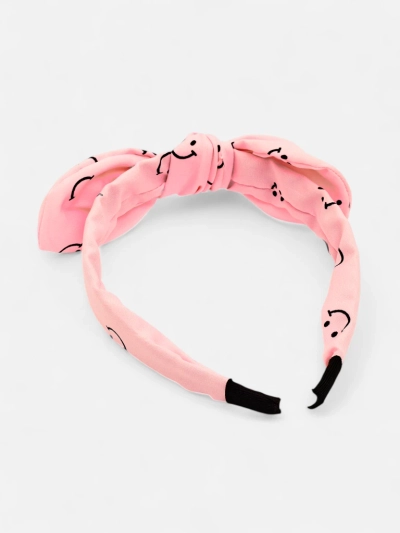 Royalfashion Kinderhaarband mit Schleife und Print aus lachenden Gesichtern