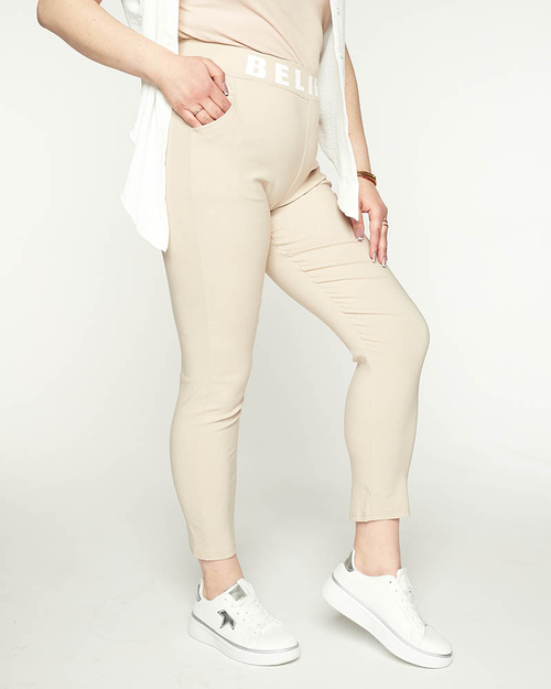 Бежеві жіночі штани з тканини - Одяг