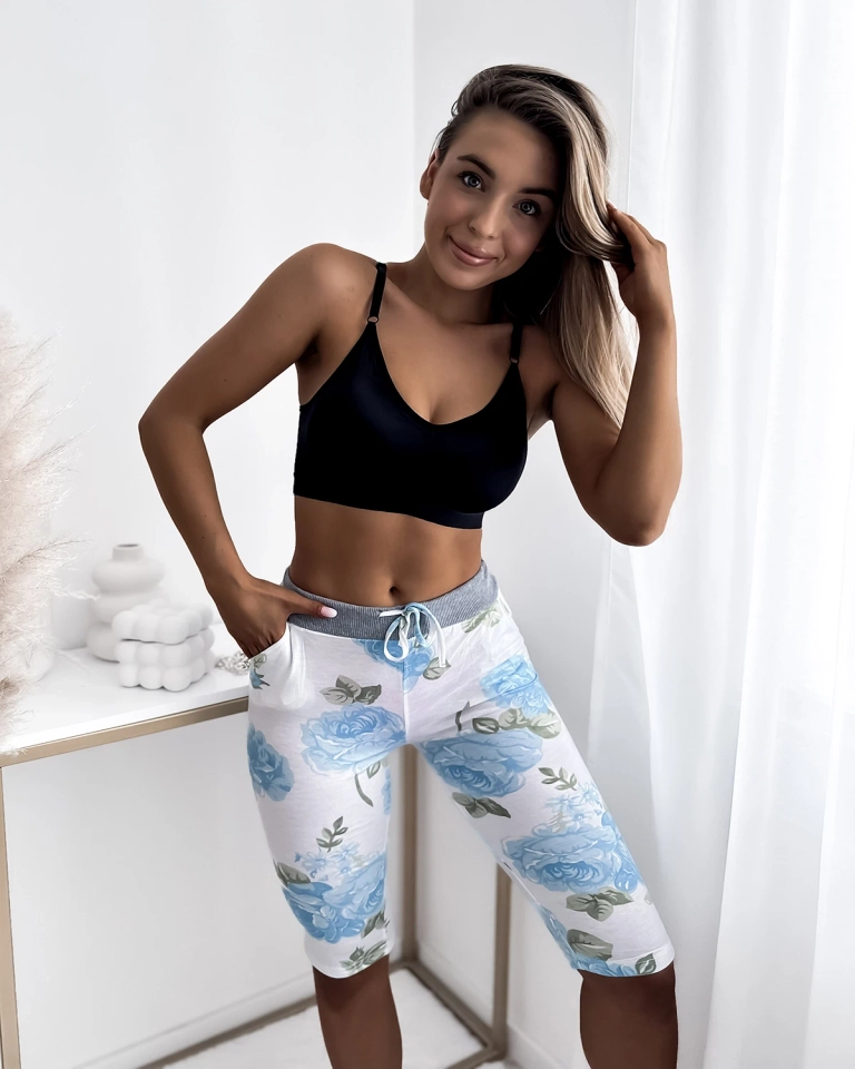 Weiße 3/4-Shorts für Damen mit blauen Blumen - Kleidung