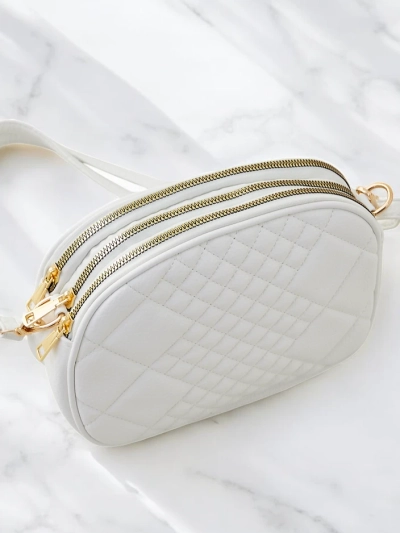 Royalfashion Kleine ovale Handtasche für Frauen aus ökologischem Leder