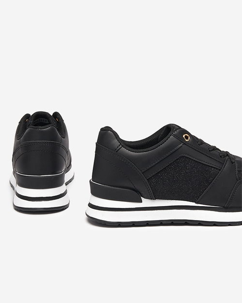 Чорне жіноче спортивне взуття Uzzuci- Взуття