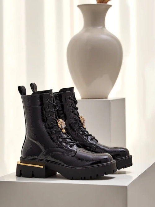 Royalfashion Жіночі чоботи на низькому ходу з патентної шкіри Tesiolle