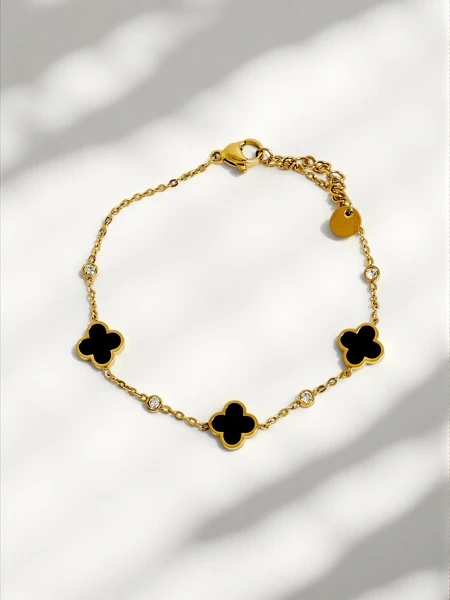 Armband Aurelia Bianca mit Blumen in schwarzer Perlmuttoptik, vergoldet