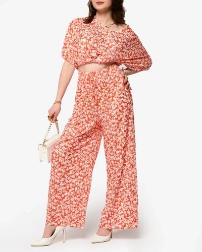 Orangefarbenes Damenset mit schwarzen Blumen - Kleidung