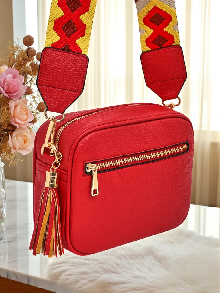 Royalfashion Kleine Damenhandtasche aus Öko-Leder mit buntem Riemen Kovi Lace