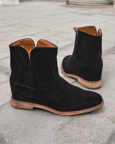 Kuhfashion Cowboy-Stiefel auf einem überzogenen Keilabsatz Blueston