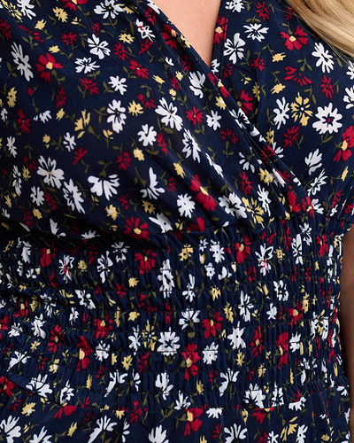 Жіночий темно-синій комбінезон з квітами - Одяг