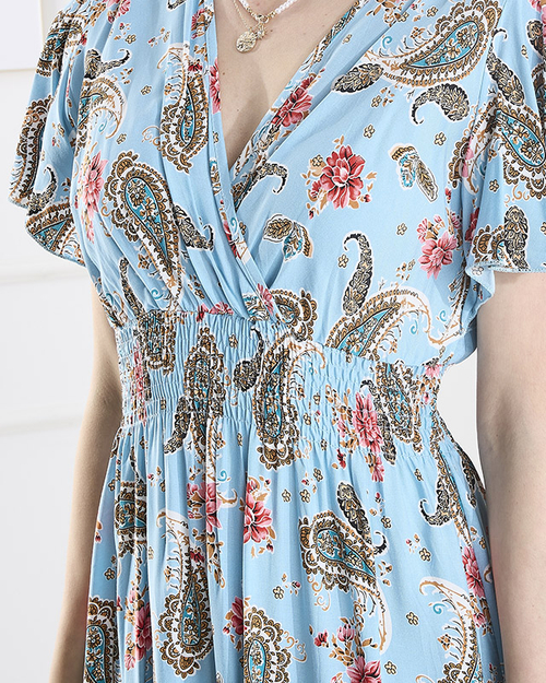 Жіноча сукня міді з візерунком синього кольору - Одяг