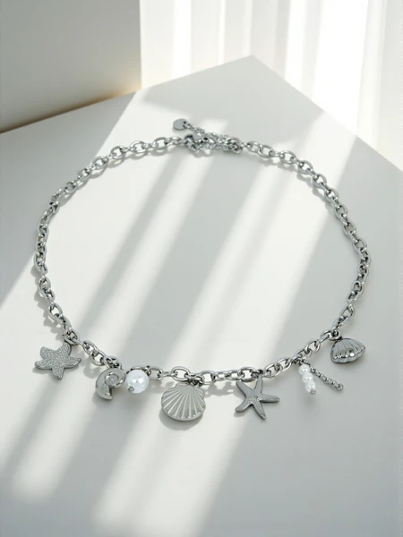 Намисто Atena Charm Sea – золоті амулети з морськими мотивами