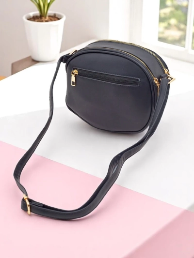 Royalfashion Kleine runde Damenhandtasche aus Öko-Leder Riva Circle