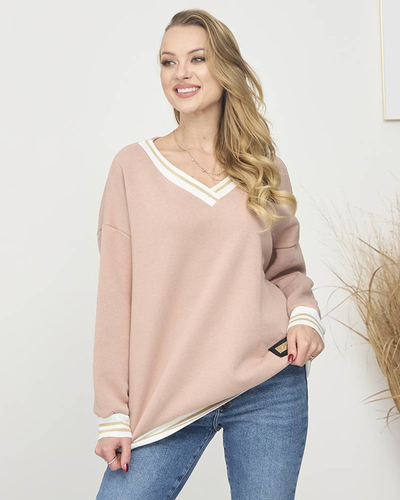 Isoliertes Damen-Sweatshirt in rosa- Kleidung