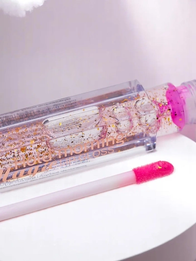 Farbloser Lipgloss 24K feuchtigkeitsspendend mit goldenen Partikeln