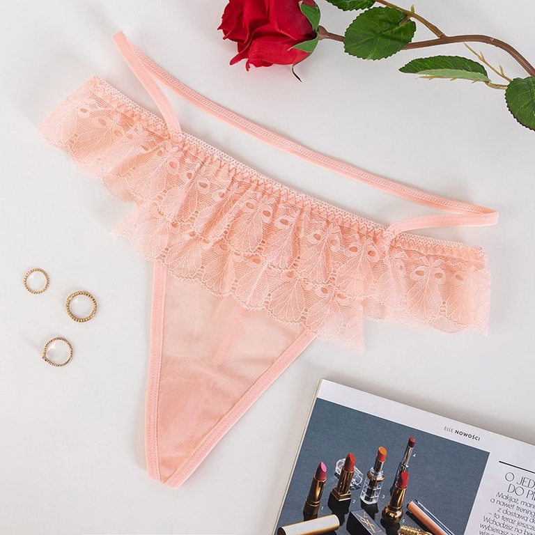 Rosa Spitzenstring der Frauen - Unterwäsche