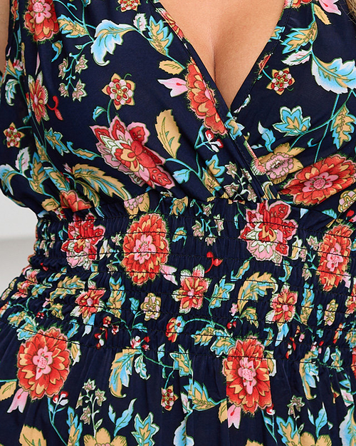 Жіноча темно-синя коротка літня сукня з різнокольоровими квітами - Одяг