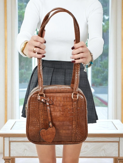 Lackierte kleine Damenhandtasche aus Öko-Leder Velinne