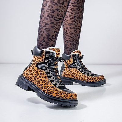 Stiefel mit Leopardenmuster, isoliert mit Dori-Schaffellmantel - Schuhe