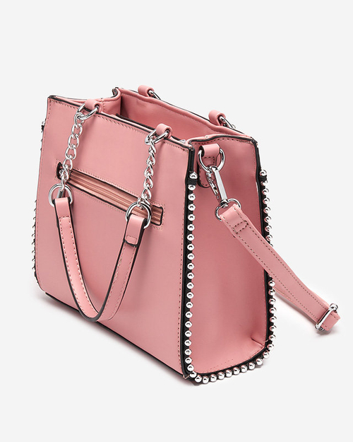 Рожева жіноча сумочка з плетеною вставкою