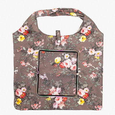 Braune geblümte Einkaufstasche, gefaltet zu einer Brieftasche - Accessoires