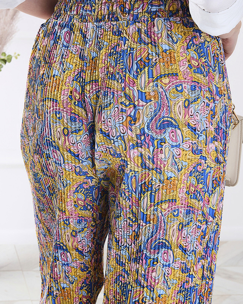 Жіночі візерункові брюки з широкими штанинами жовтого кольору - Одяг