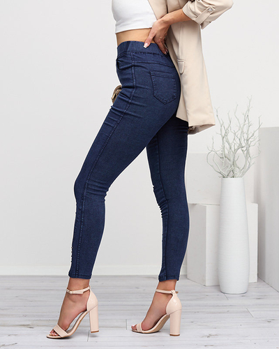 Темно-сині жіночі штани з вирізами і стразами