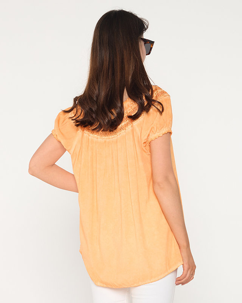 Жіноча бавовняна блузка оранжевого кольору з ажуром - Одяг