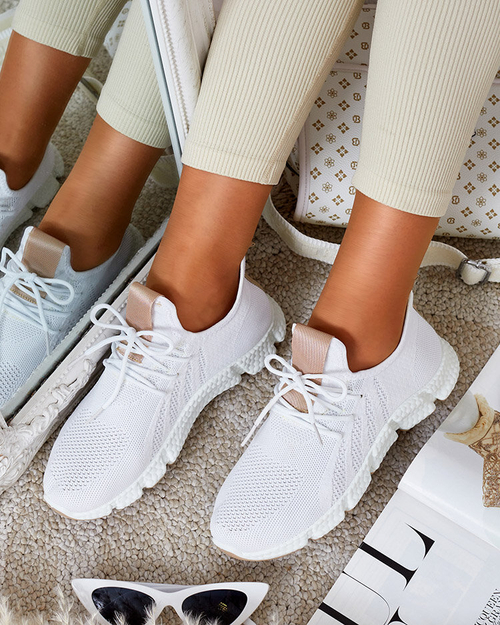 Білі жіночі кросівки з бежевими вставками Baym